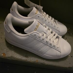 Adidas Women's White Sneakers with Gold Accents